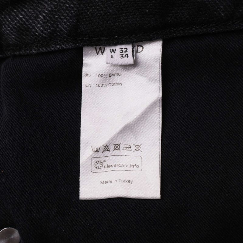 Materiallapp i jeans med information 100% bomull och tvättråd