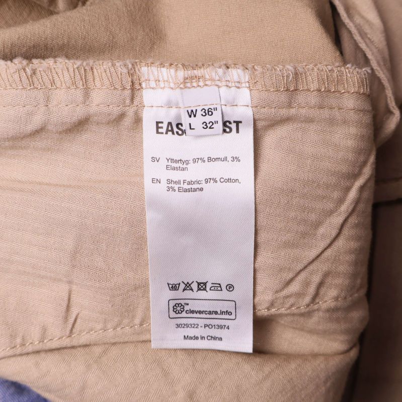 Materiallapp med tvättråd och innehåll: 97% bomull, 3% elastan