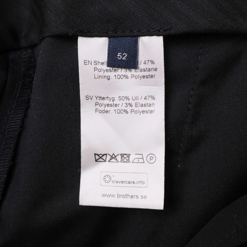 Materiallapp med sammansättning för kostymbyxor