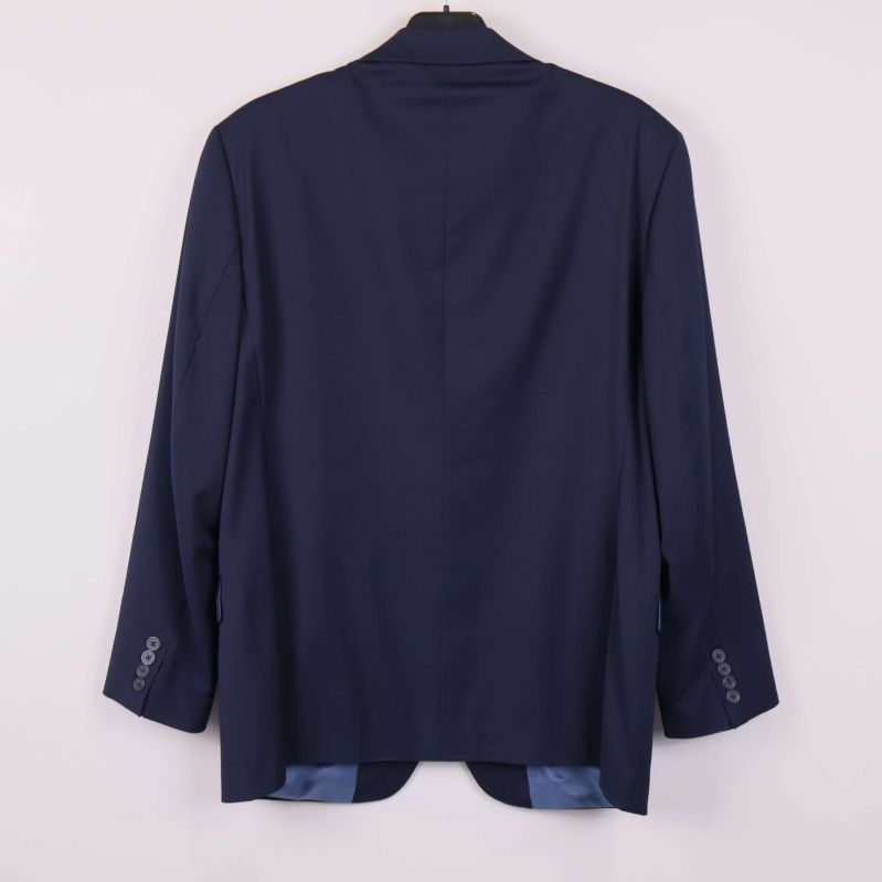 Marinblå kavaj Dressmann bakifrån på galge