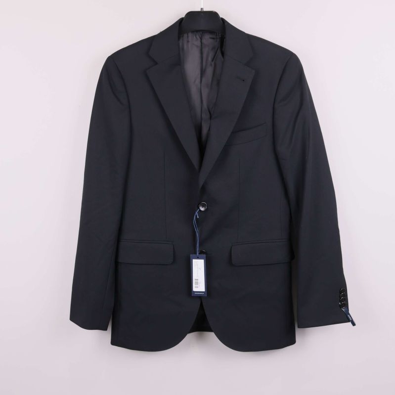 Mörk kavaj på galge med märkestag