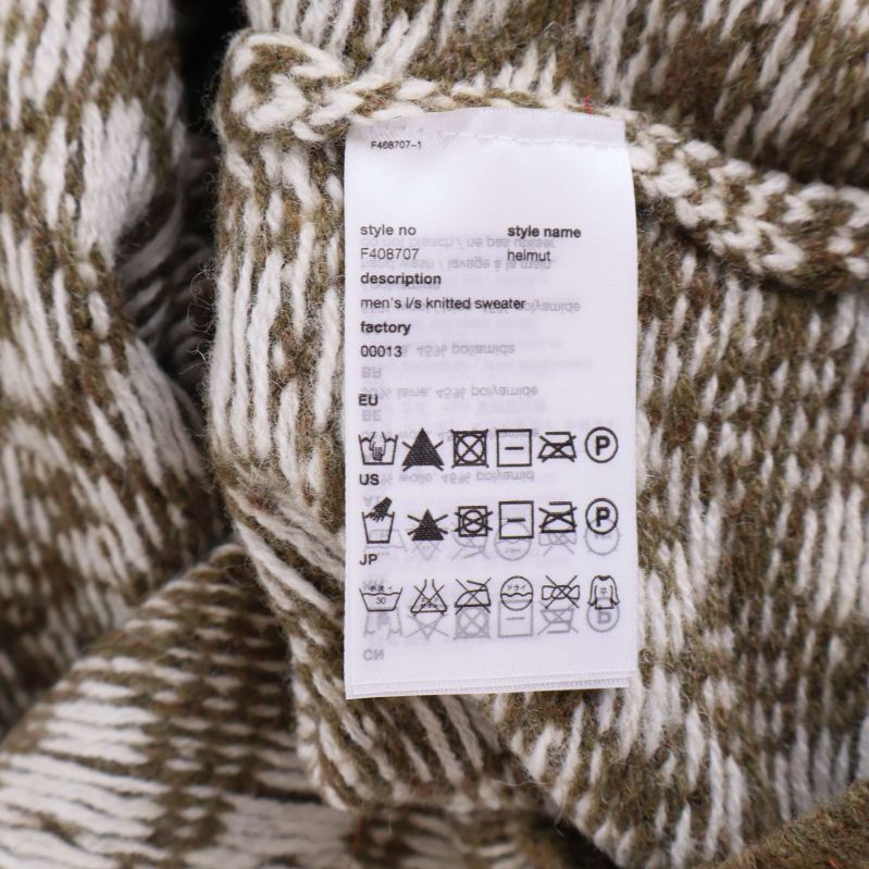 Materialetikett med tvättråd och materialinformation