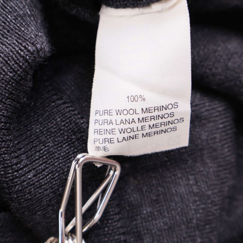 Materiallapp med texten 100% Pure Wool Merinos
