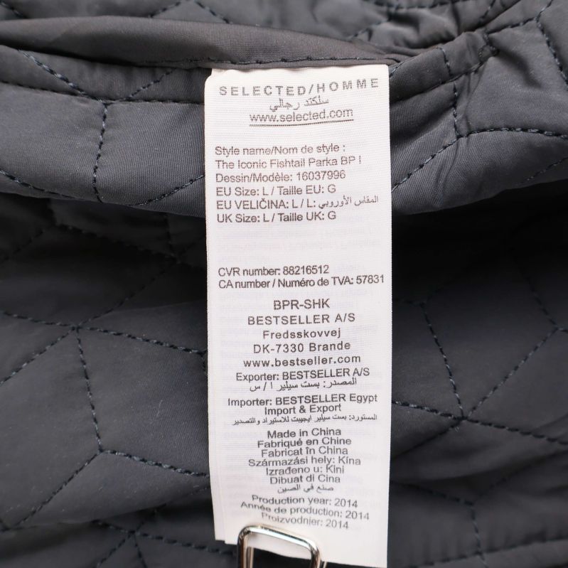 Inneretikett från Selected Homme med stil- och tvättinformation