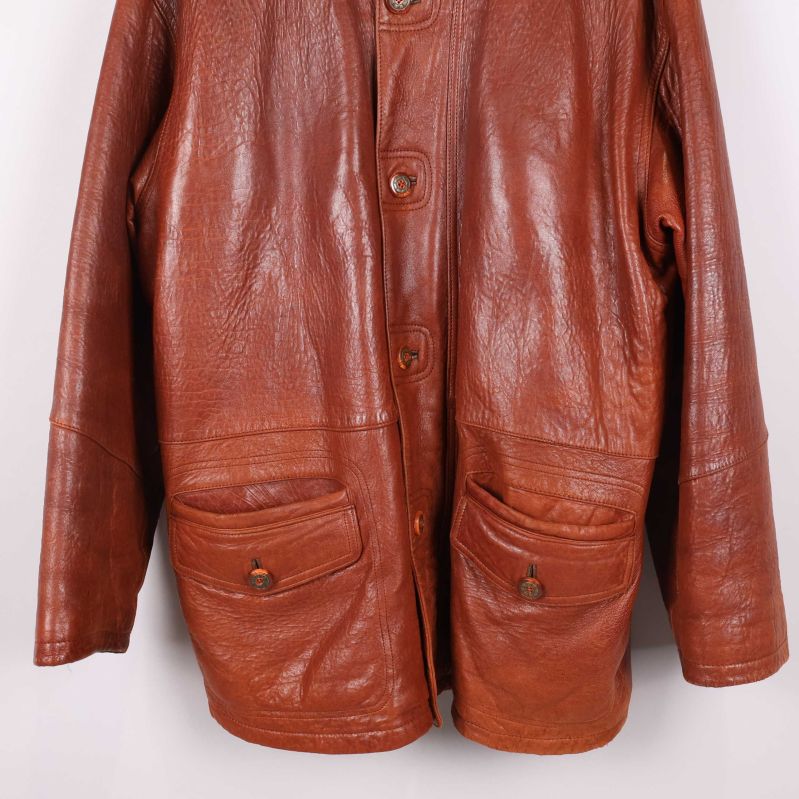 Detalj av fickor och knäppning