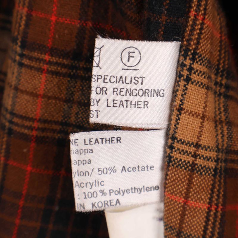 Jackans material- och tvättetikett