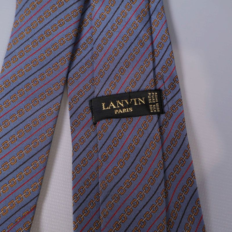 Närbild på Lanvin Paris-svart etikett på slips