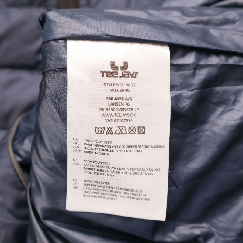 Materiallapp med tydlig information om material och tvättråd