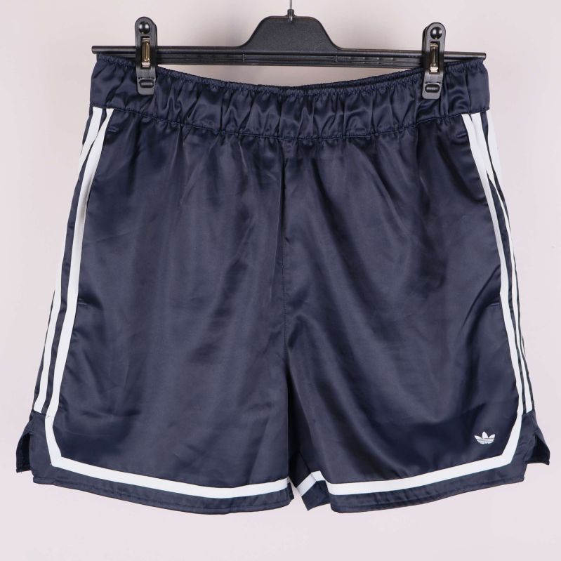 Mörkblå sportshorts med vita ränder och elastisk midja