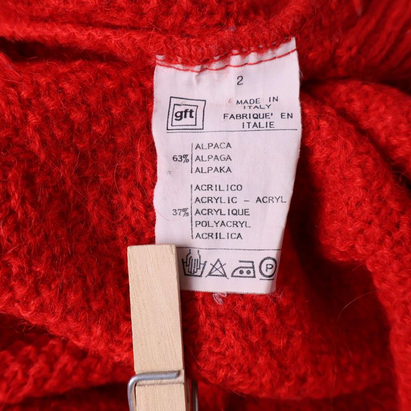 Materiallapp visar 63% alpacka och 37% akryl