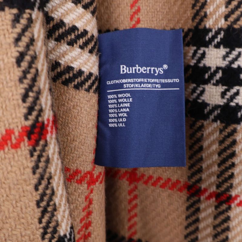 Materiallapp som visar 100% Ull