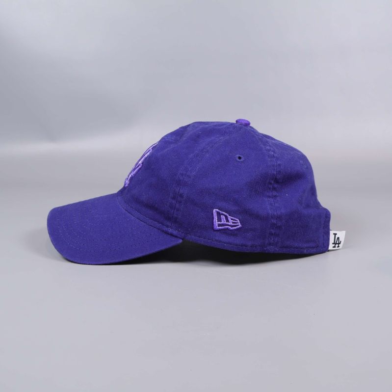 Keps från sidan med New Era-märke och justerbart spänne