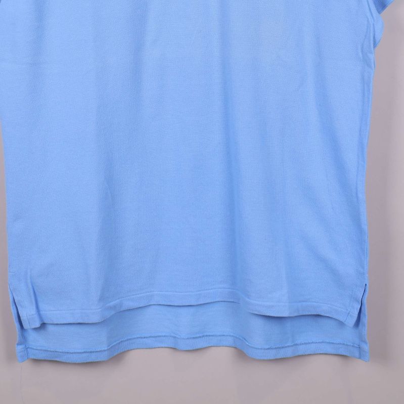 Nedre delen av pikétröjan med slitsar