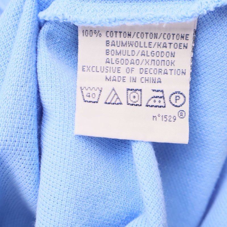 Materialetikett visar 100% bomull