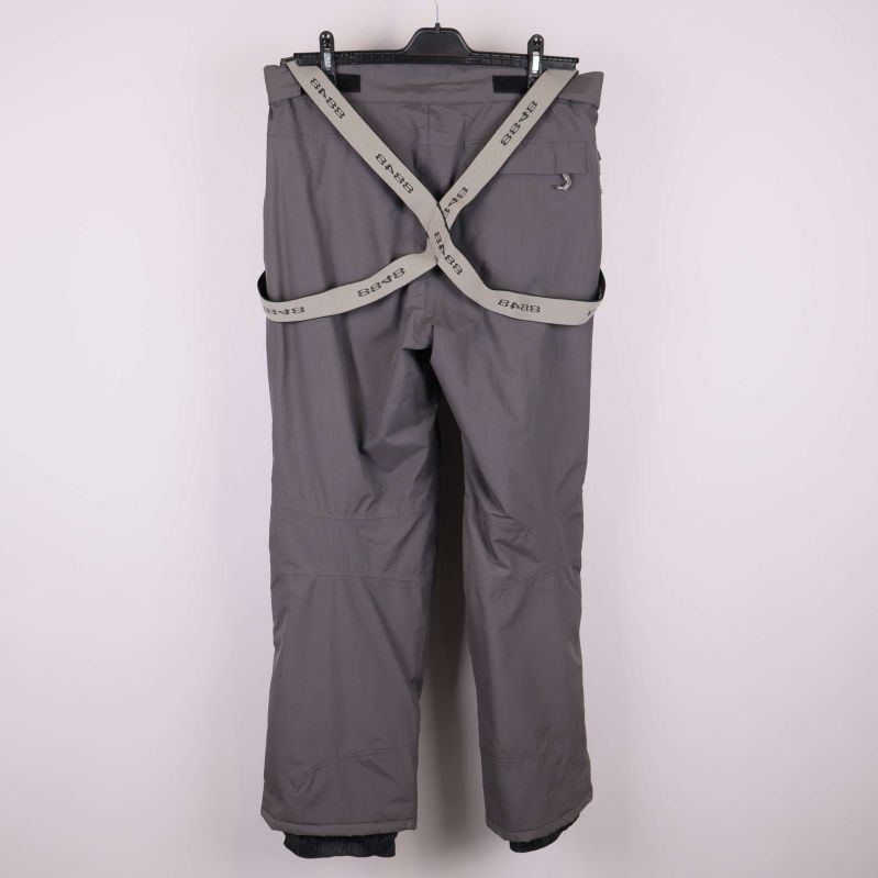 Grå skalbyxa med korsade hängslen baktill