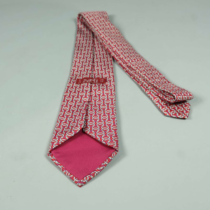 Hermès-slips baksida med insydd etikett och foder i rosa