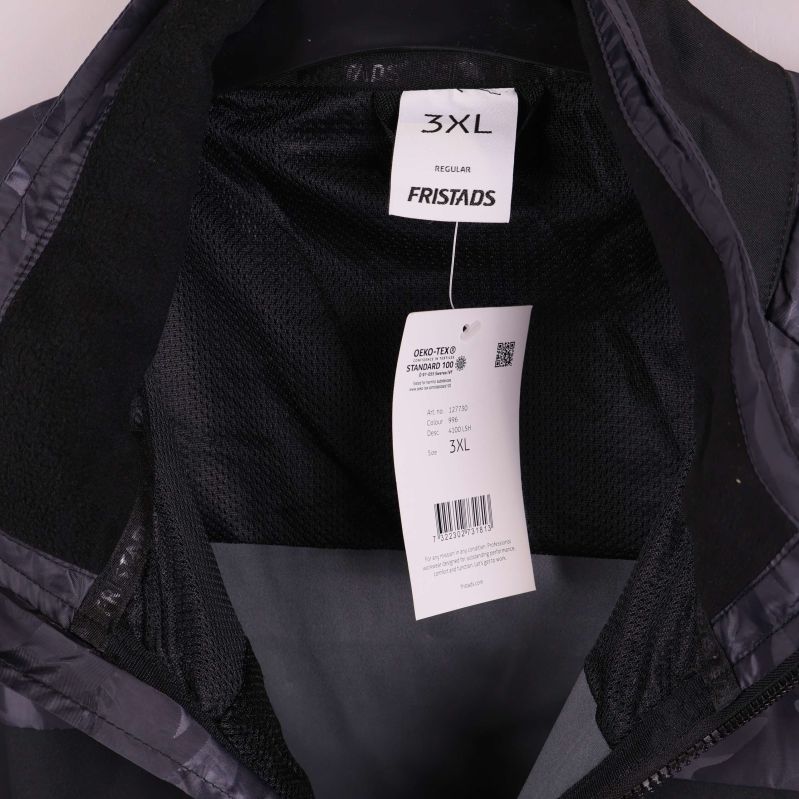 Jackans storleksetikett med FRISTADS och 3XL visas