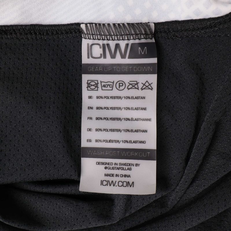 Materiallapp med information om polyester och elastan