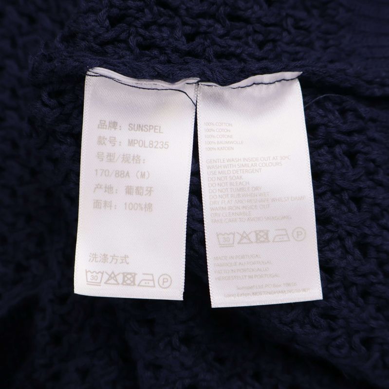 Tvättrådsetikett med materialinformation