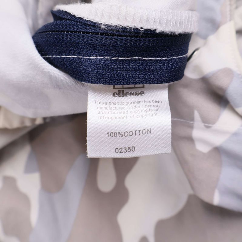 Materiallapp med texten 100% bomull från Ellesse