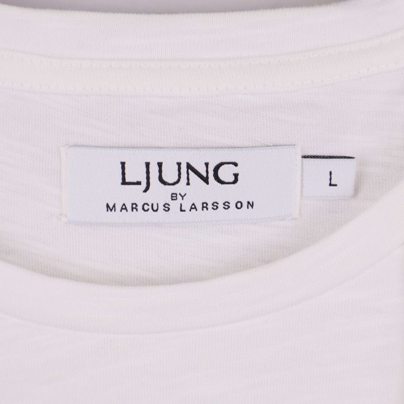 Närbild på etikett med märket Ljung by Marcus Larsson