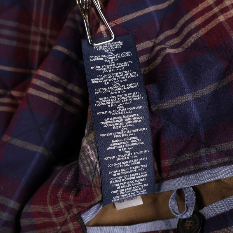 Materiallapp med information om jackans materialinnehåll