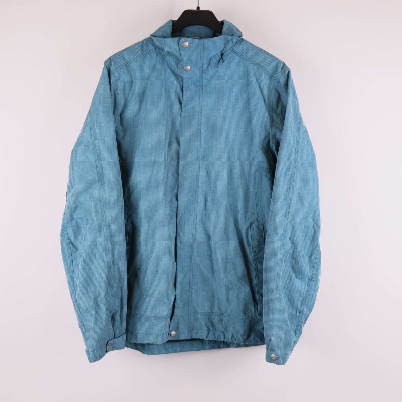 Blå vattentät jacka med huva framifrån