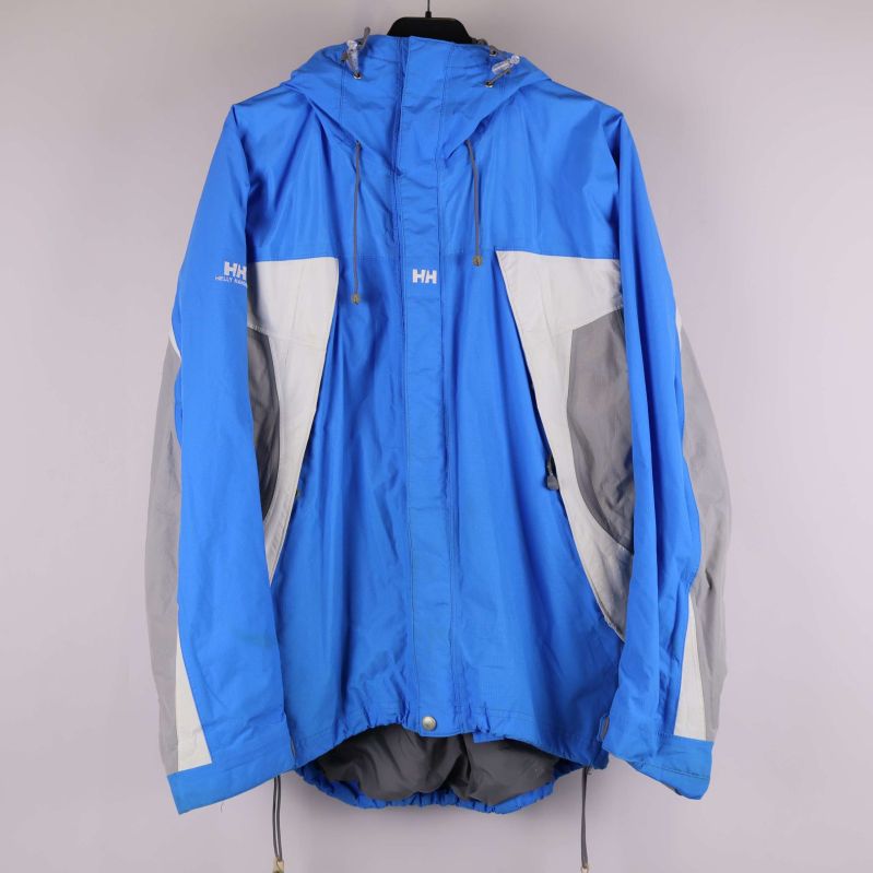 Framsida av blå och grå jacka med huva