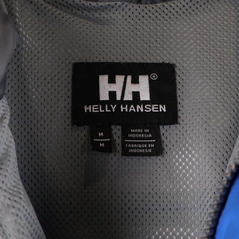 Helly Hansen inneretikett på grått meshfoder