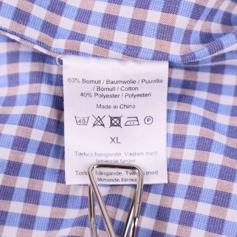 Materiallapp visar 60% bomull och 40% polyester XL