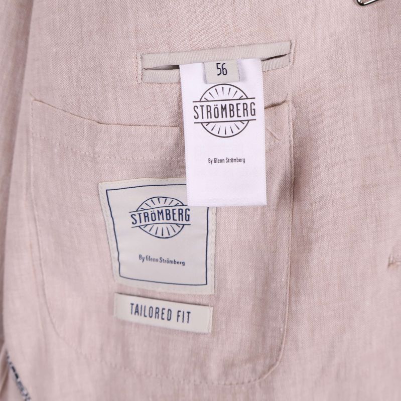 Storleksetikett 56 med Strömberg logga på insidan av kavaj