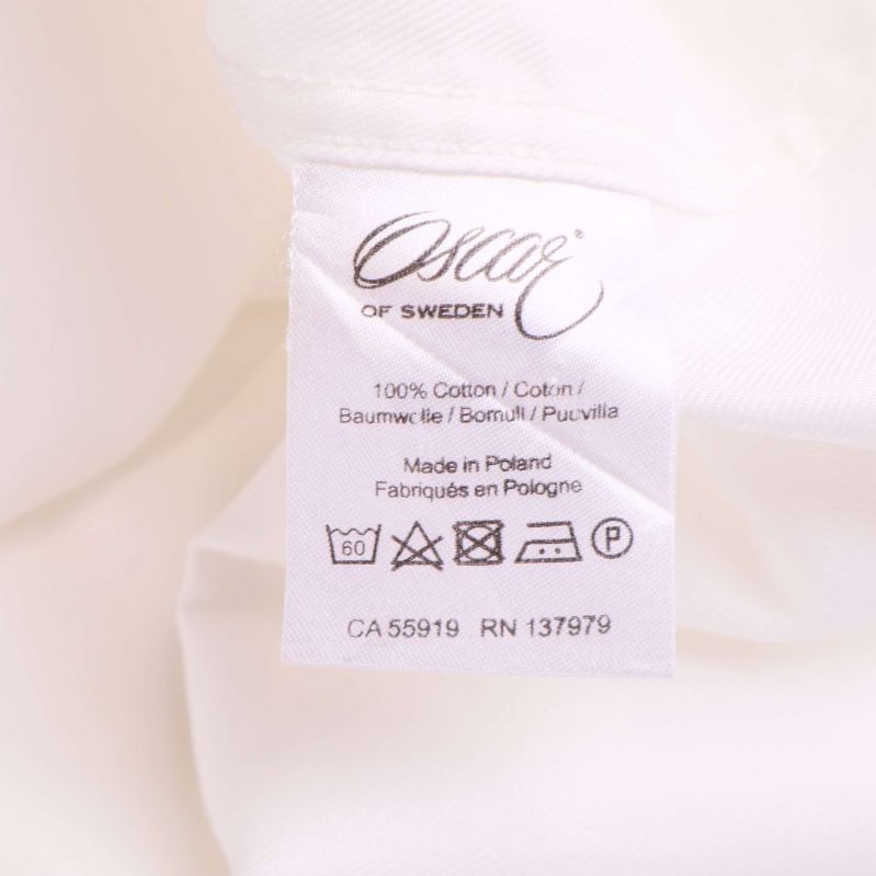 Materiallapp med 100% bomull och skötselråd