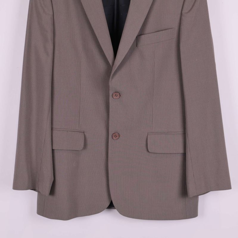 Närbild av undre ficka och tygstruktur