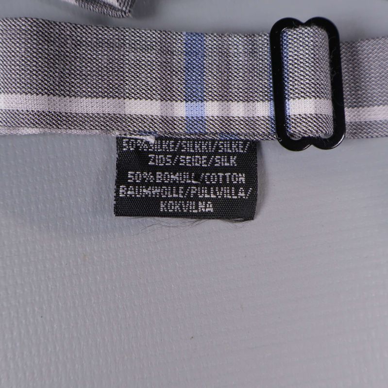 Materiallapp med texten 50% bomull 50% silke