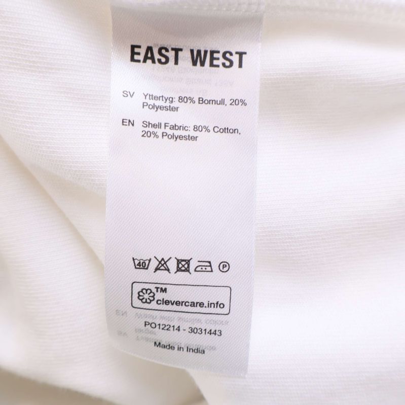 Materiallapp visar 80% bomull och 20% polyester