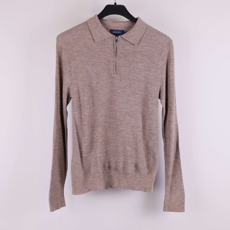Beige stickad tröja med krage och dragkedja framtill