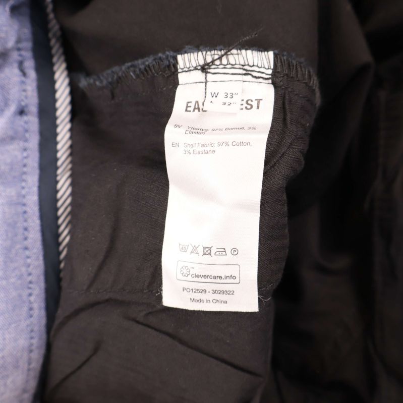 Materiallapp visar sammansättning och märkning av brand East West