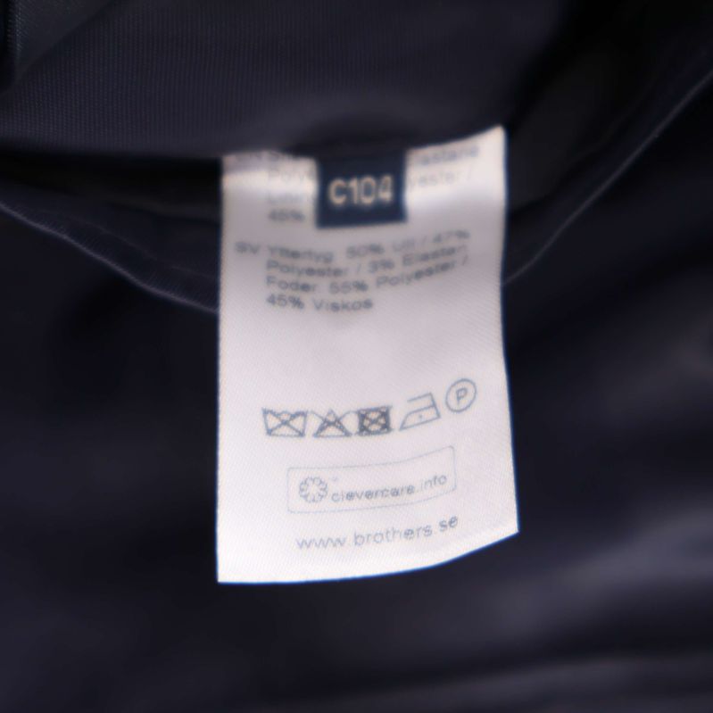 Materiallapp med innehåll: ull, polyester, viskos