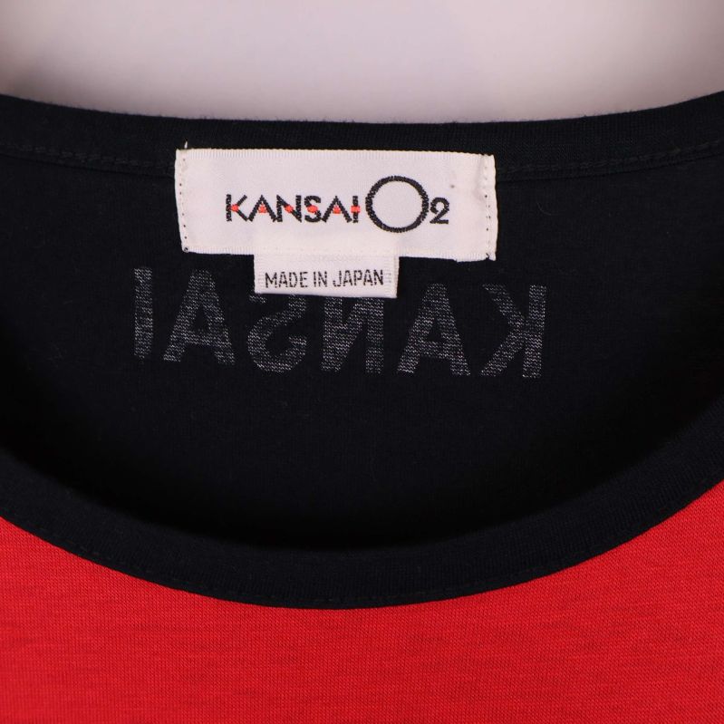 Närbild på etikett med Kansai O2 och Made in Japan