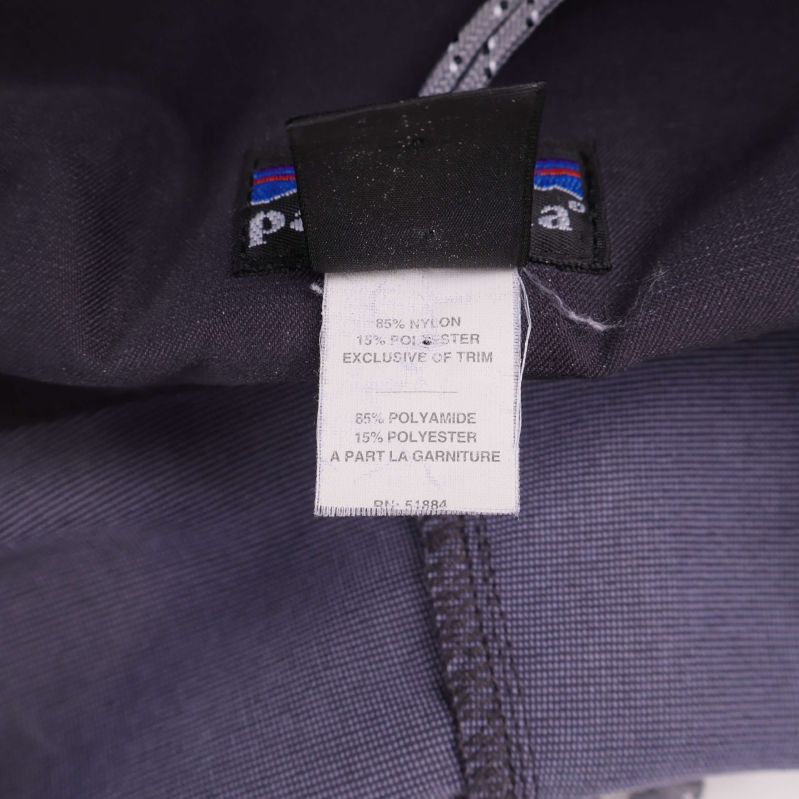 Materiallapp som visar 80% nylon och 20% polyester