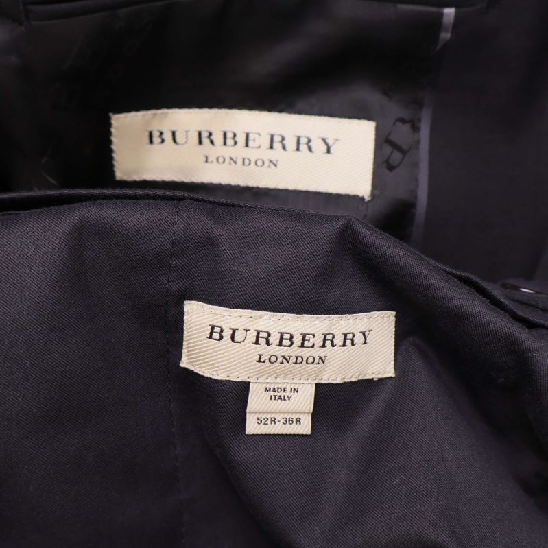 Burberry London etiketter inuti kavaj och byxa