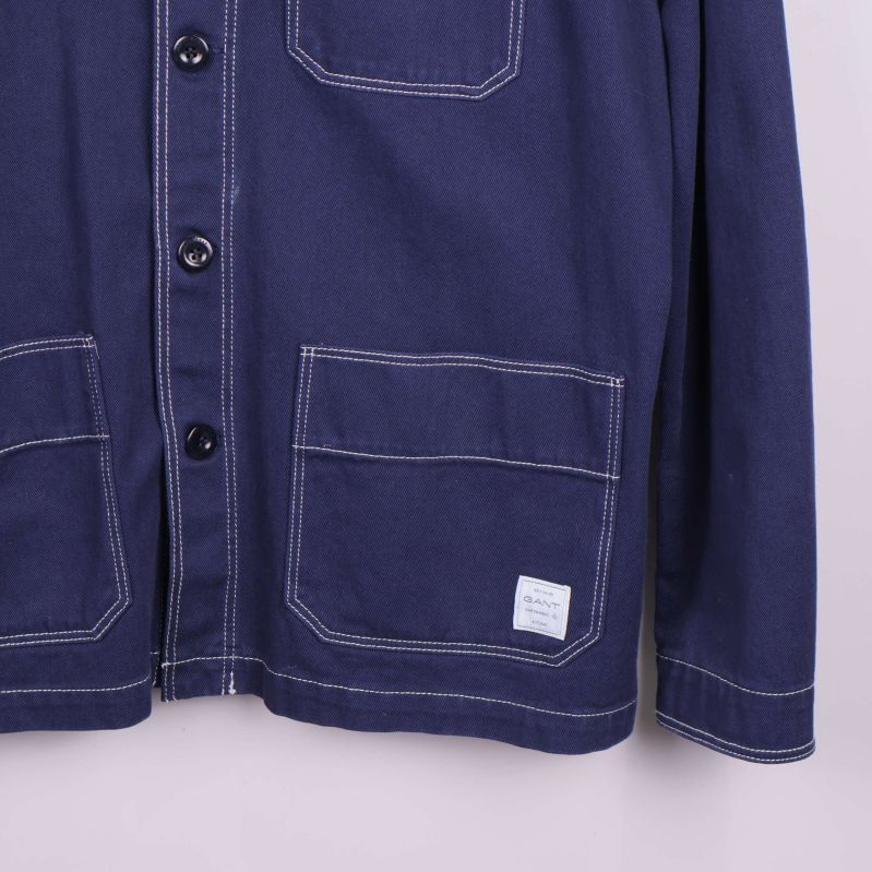 Nederdel på overshirt med två fickor och etikett