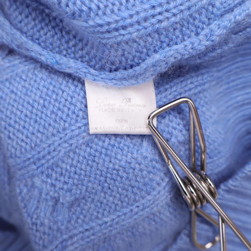 Materiallapp med märkning made in Italy och storlek XL