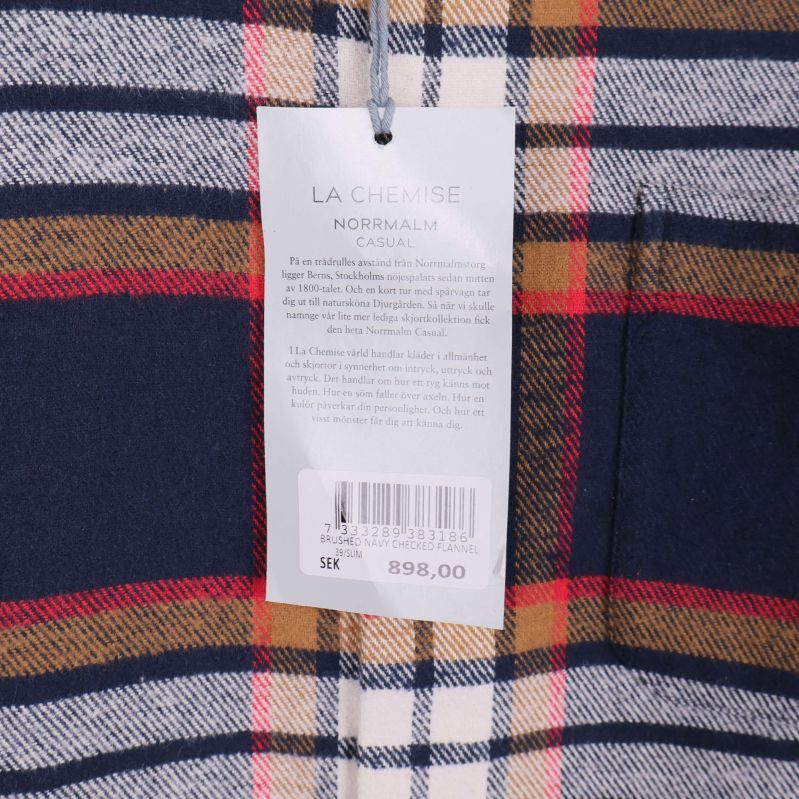 Etikett med information om LA CHEMISE Norrmalm Casual