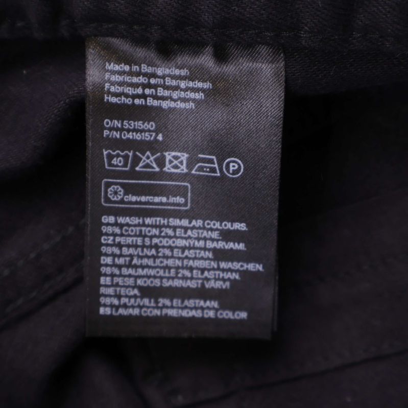 Materiallapp med tvättråd och materialinformation