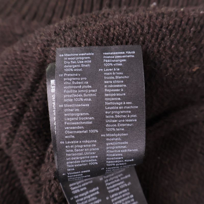 Materiallapp med information om 100% ull
