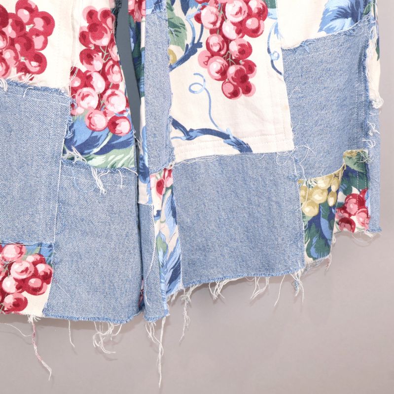 Närbild på blommiga patchwork-detaljer
