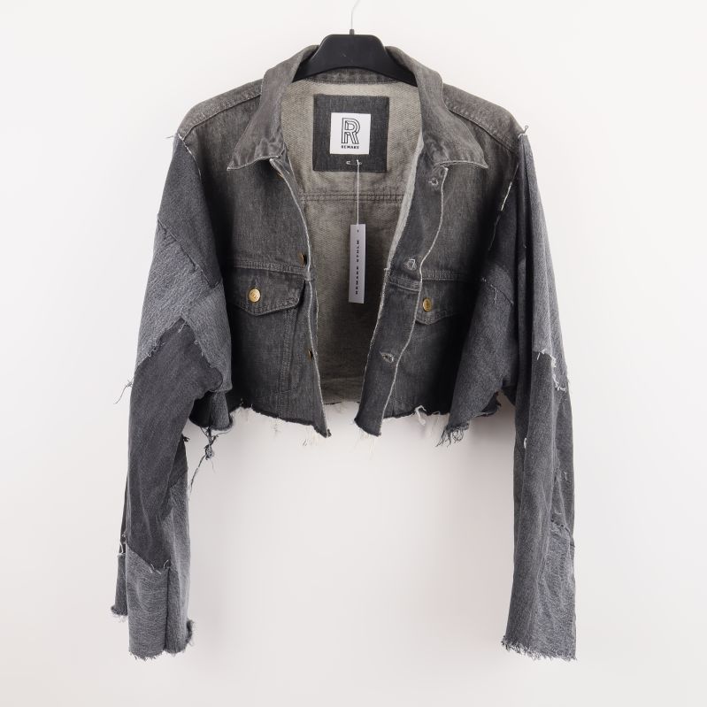 Vidöppen denimjacka med taggar insida