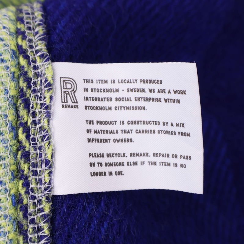 Inneretikett med information om material och ursprung