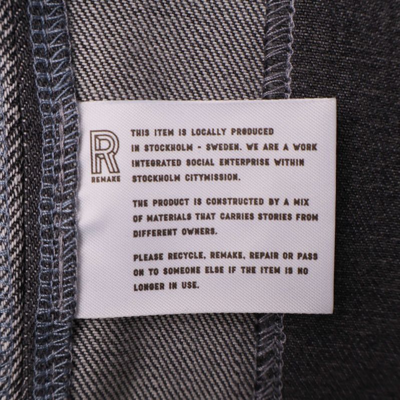 Invändig etikett med detaljer om lokal produktion